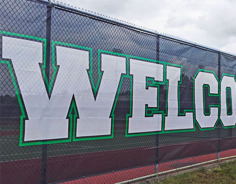 AlphaGraphics Downtown Raleigh: Bold Fence Banners and Custom Signage