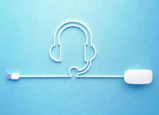 White USB cable forming the shape of a headset and microphone on a blue background—symbolizing digital customer support, VoIP services, or cloud contact centers.