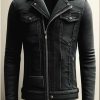 Skilled custom jacket maker crafting a leather jacket in the USA